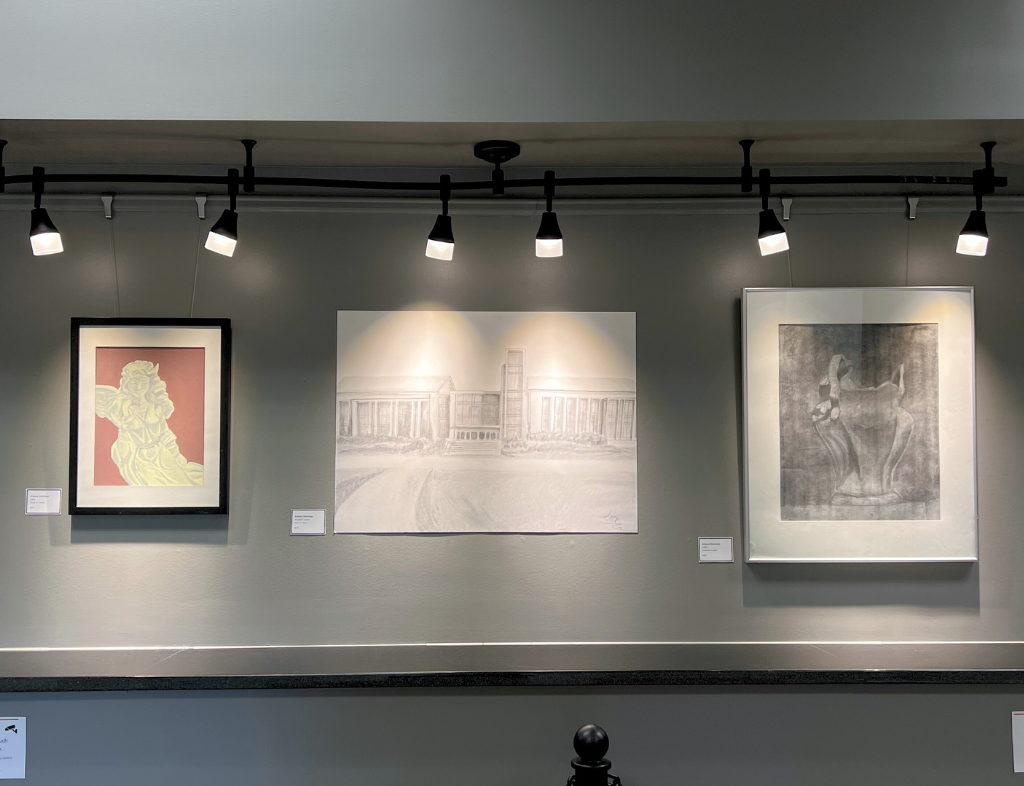 Three original pieces by artist, Arianna Stuckman - 'Fairy,' 'Student Union,' and 'Vase.'
